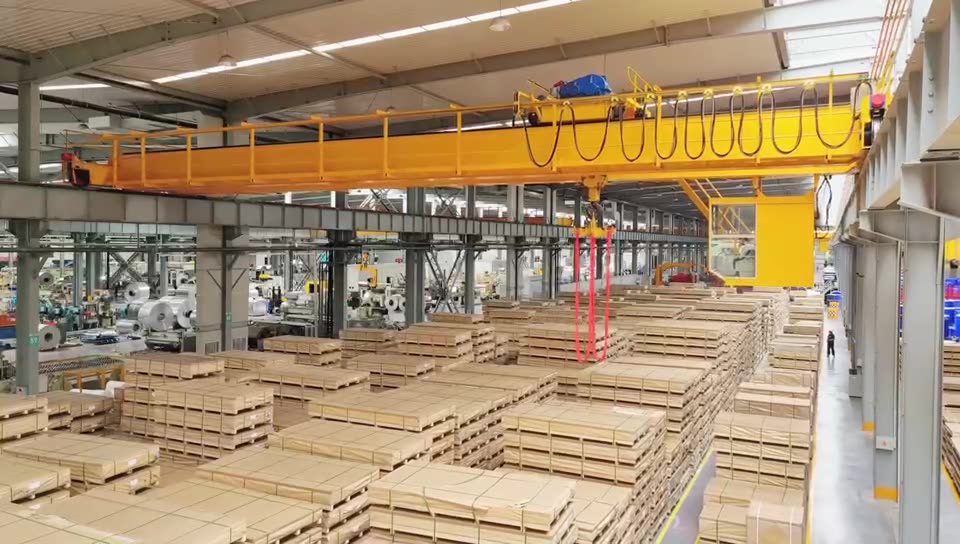 Overhead crane over packed plate stock